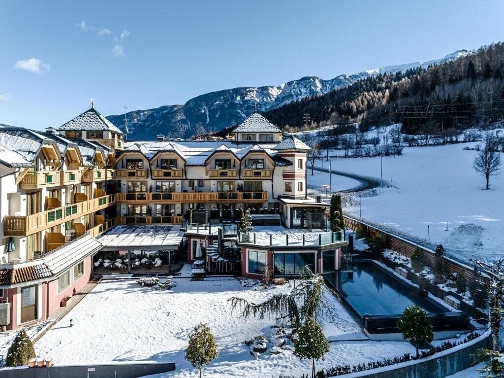 Фото Tevini Dolomites Charming Hotel 4*