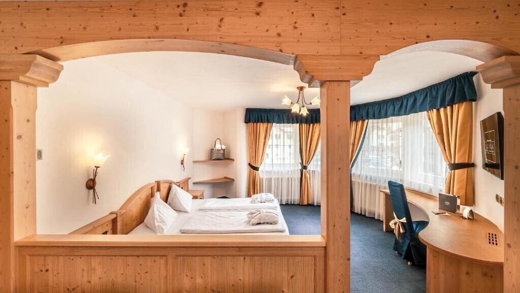 Фото Hotel La Perla Wellness & Beauty Canazei 4*