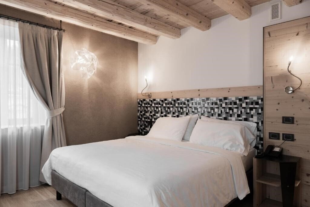 Фотографія Orso Grigio Cavalese Hotel 4*