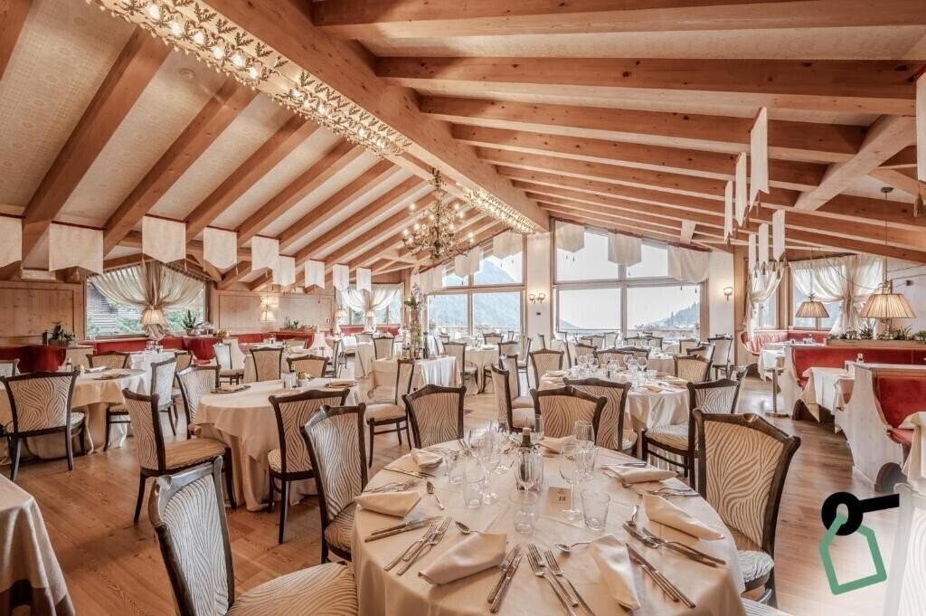 Фотографія Hotiday Room Collection Campiglio Pradalago 4*