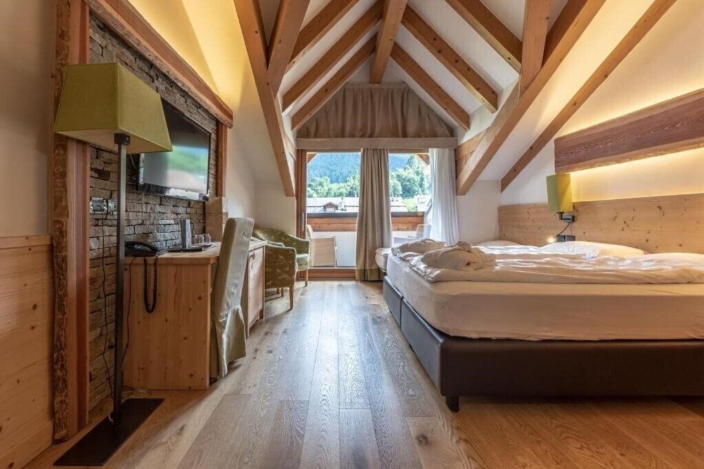 Фото Alp Holiday Dolomiti (Dimaro) 4*
