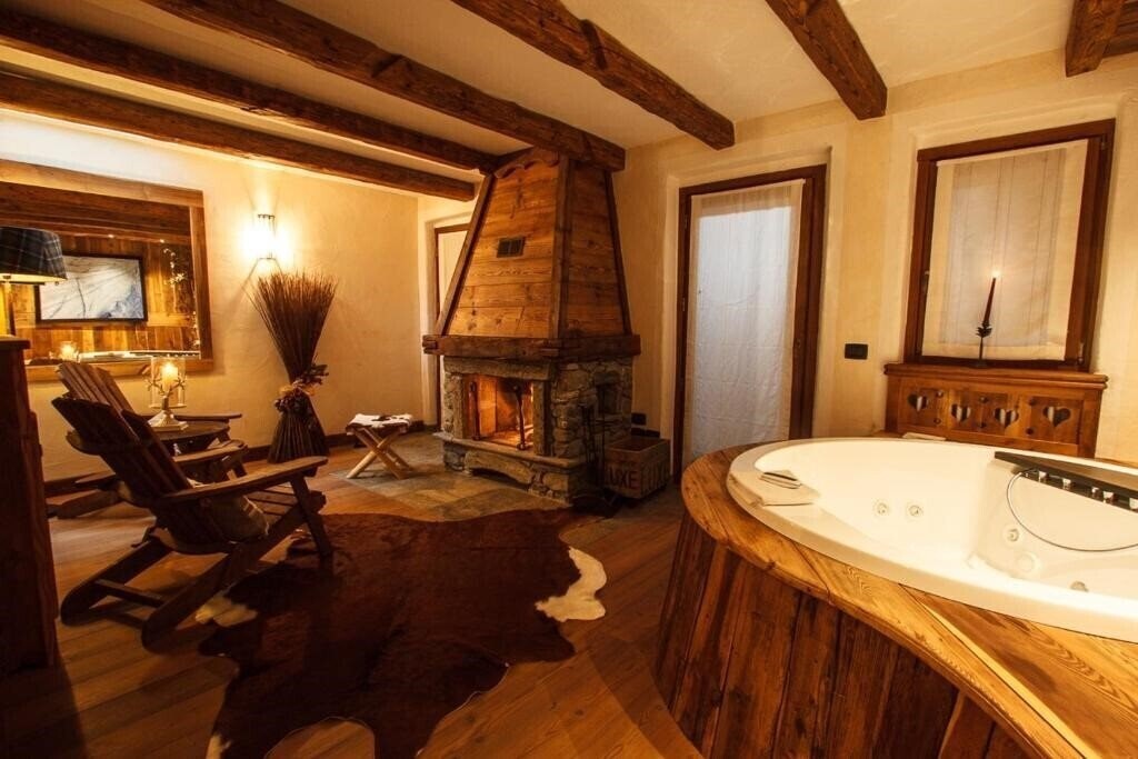 Фото Au Coeur Des Neiges Chalet Resort 4*