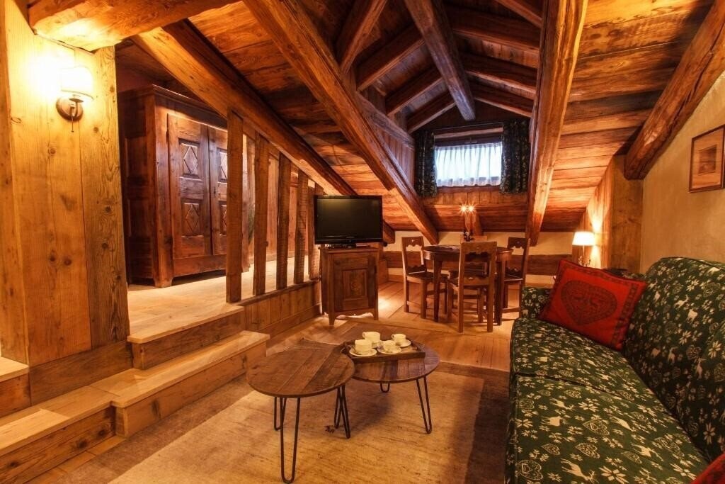Фотографія Au Coeur Des Neiges Chalet Resort 4*