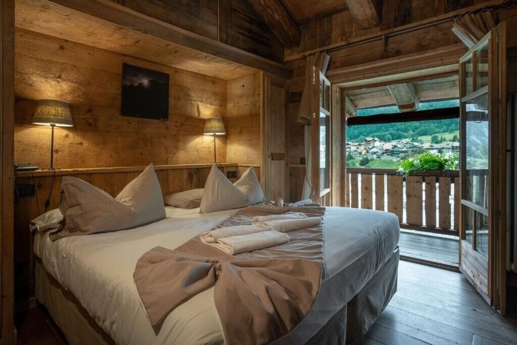 Фото Chalet Svizzero Hotel 4*