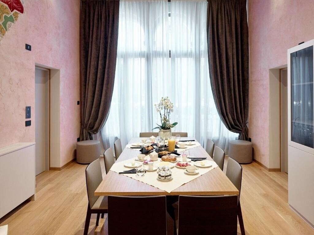 Зображення Ca' Dei Proverbi Suites 3*