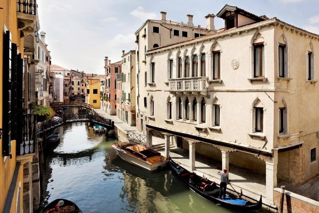 Отель Una Hotel Venezia 4*