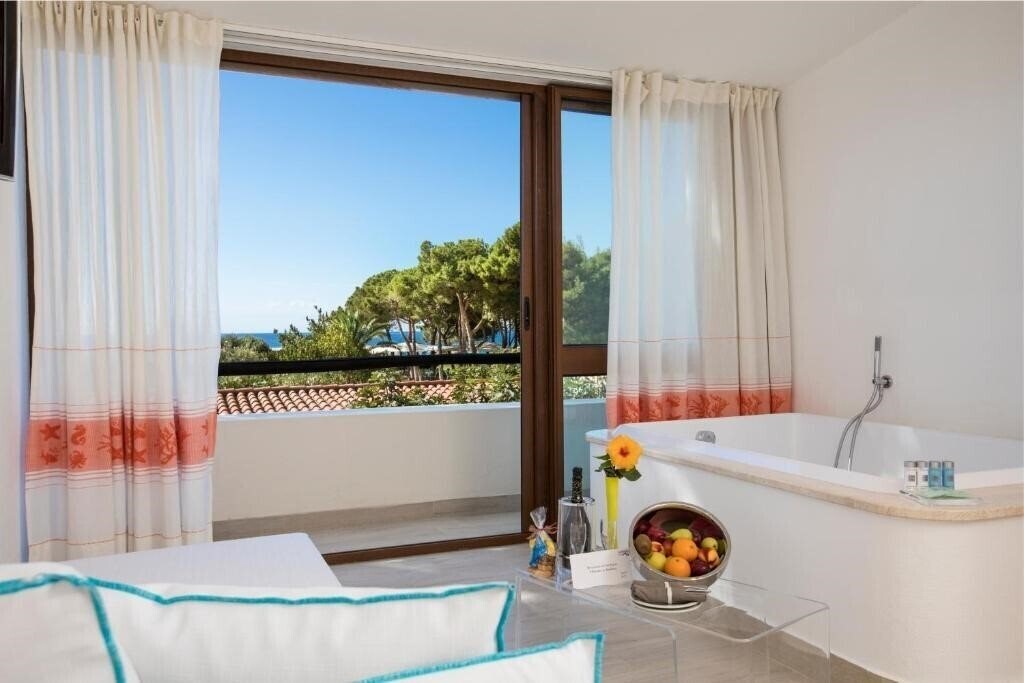 Фото Cormoran Hotel & Residence 4*