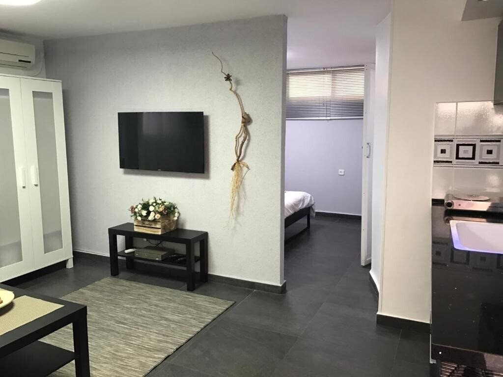 Фотографія Cozy Modern Apartment Near The Sea In City Center апартаменты