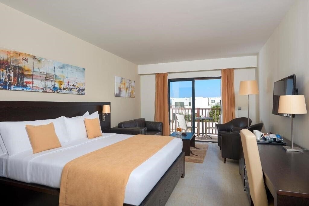 Фото Melia Llana Beach Resort & Spa 5*