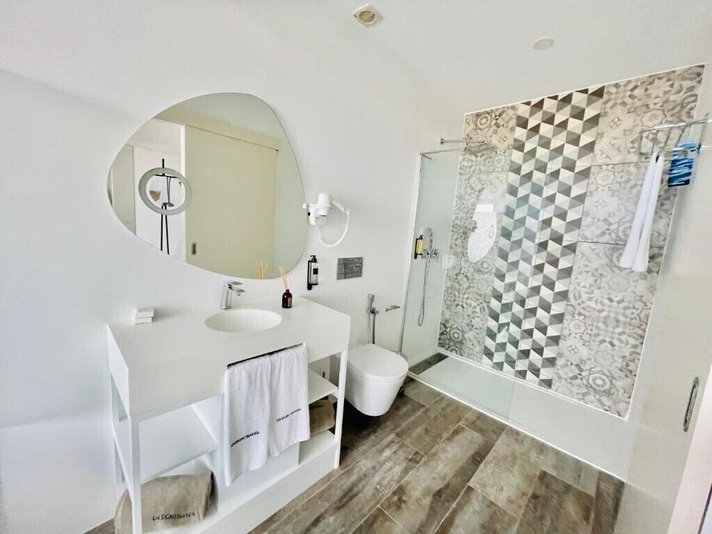 Фото Design Suites Boutique Hotel - Adults Only 4*