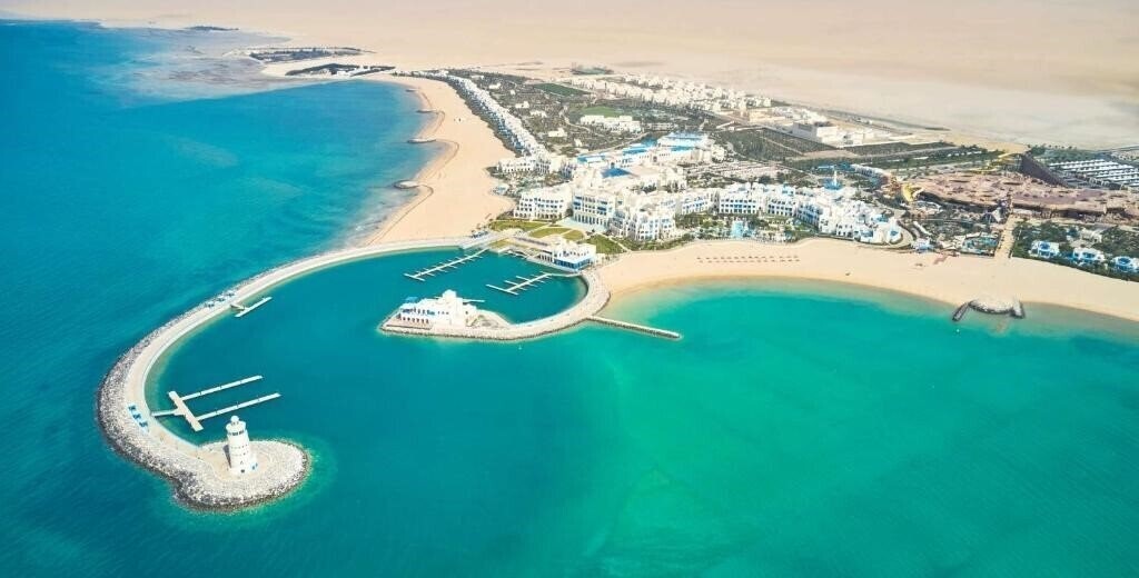 Фото Hilton Salwa Beach Resort & Villas 5*