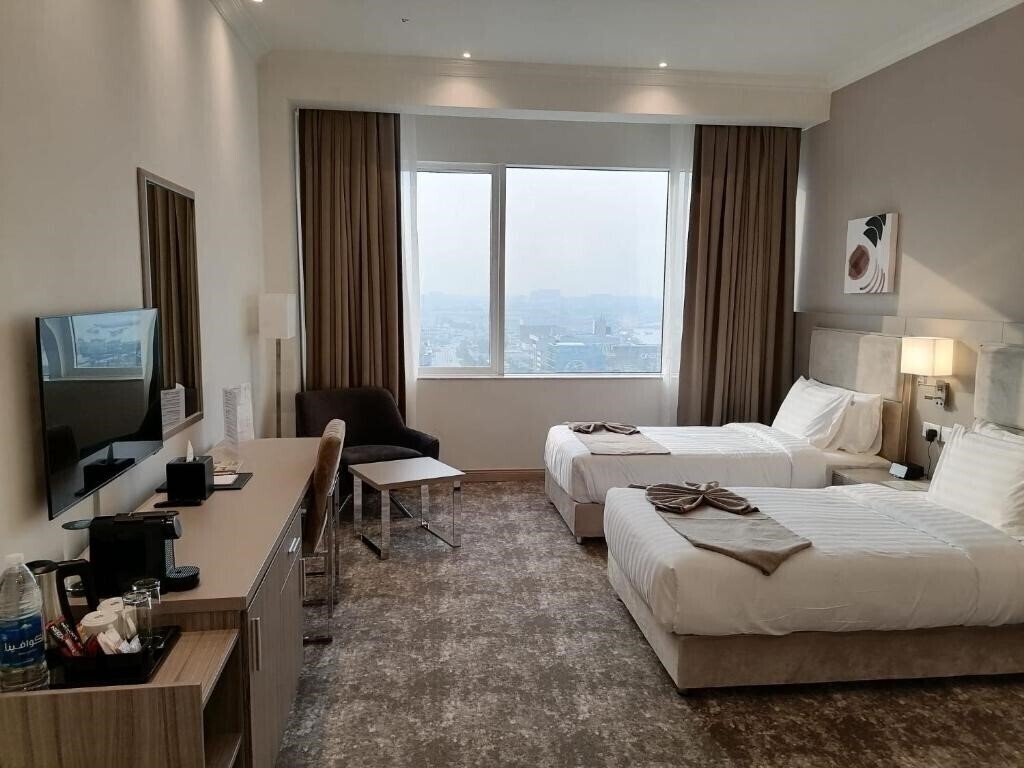 Отель Gloria Hotel & Suites Doha 4*