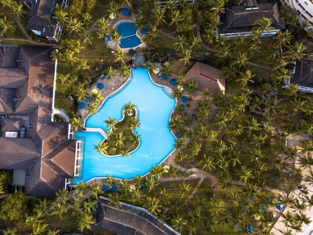 Отель Prideinn Flamingo Beach Resort 4*
