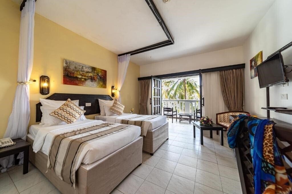 Фото Prideinn Flamingo Beach Resort 4*