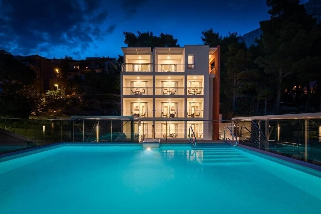 Отель Noemia Apartments 4*