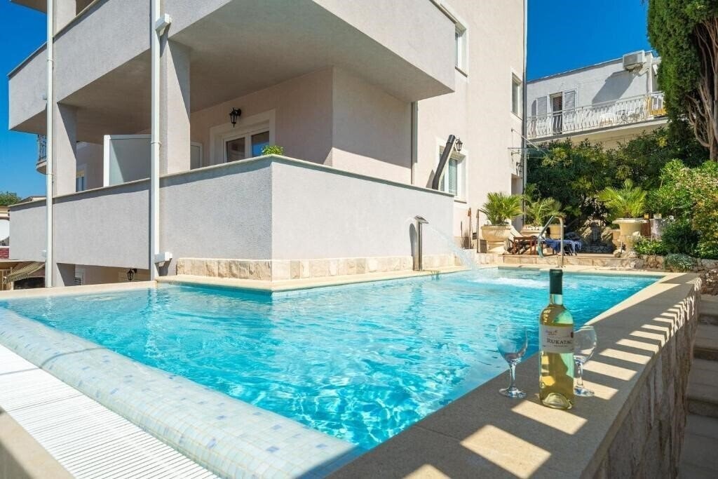 Фото Apartments Aura 4*