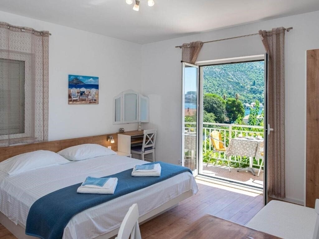 Фотографія Apartments Njiric 3*