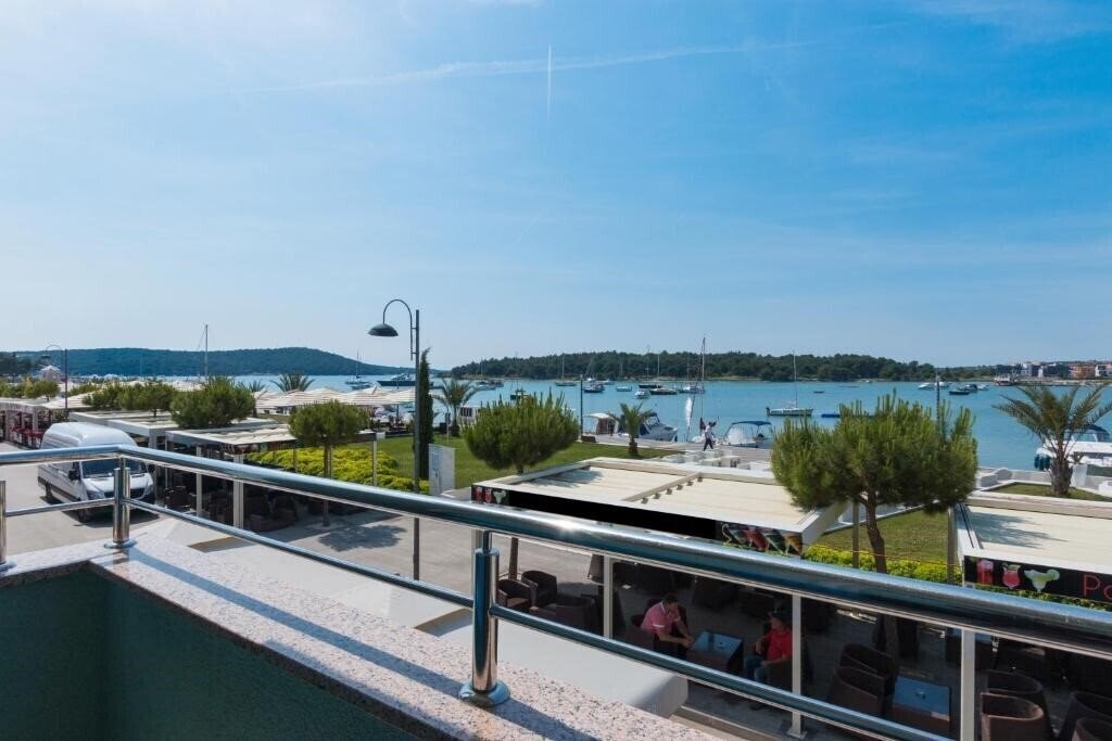 Фотография Riva Apartment апартаменты