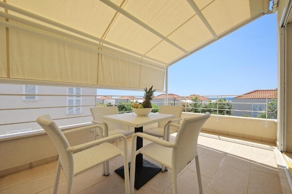Фотография Falkensteiner Apartments Petrcane 4*