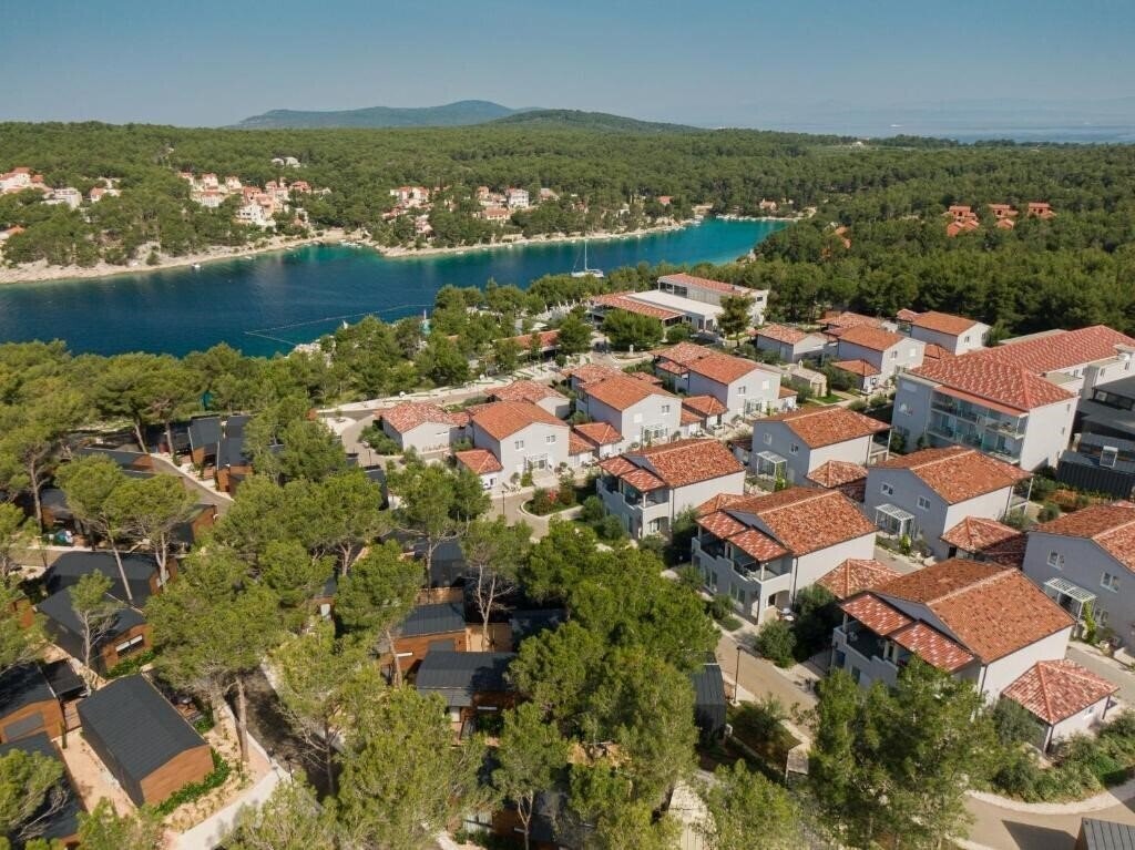 Отель Gava Waterman Island Cottages 4*