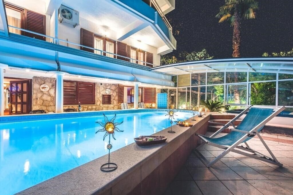 Фотографія Villa Roses Apartments & Wellness 5*