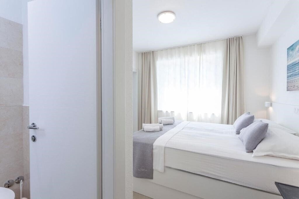 Изображение Sunset Split Rooms 3*