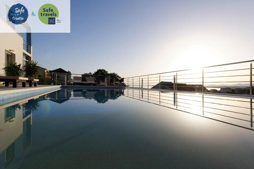 Отель Villa Mermaid 4*