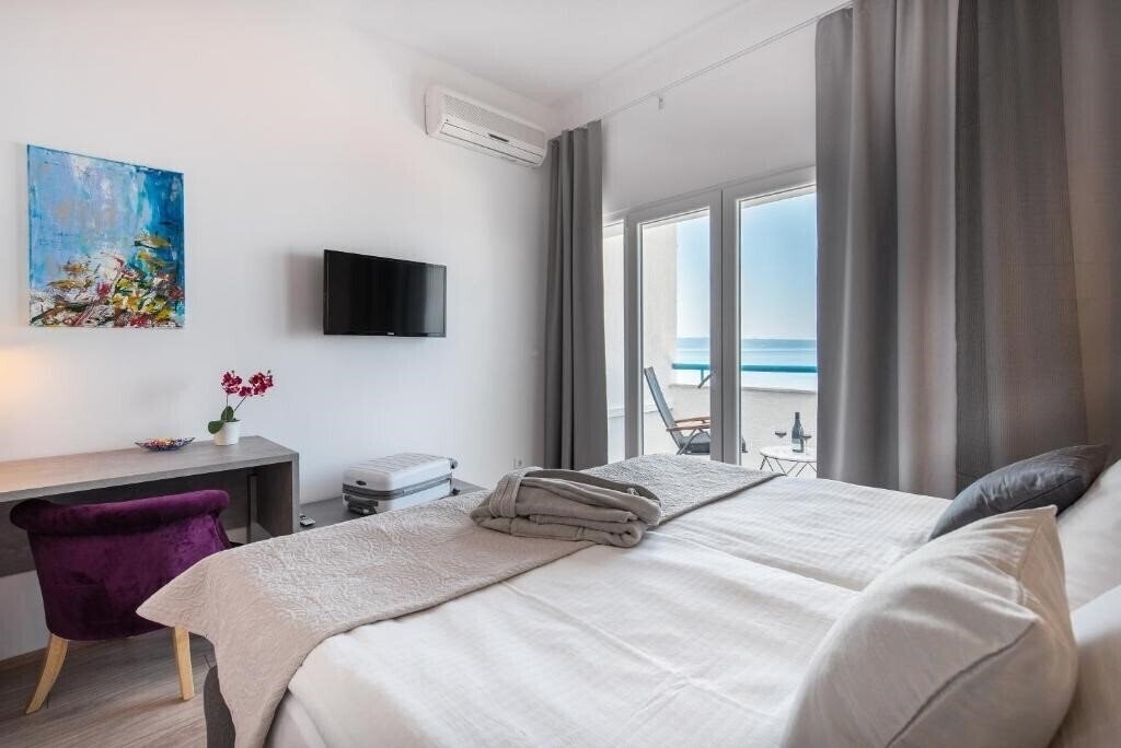 Фото Beachfront Apartmants Zanic 3*