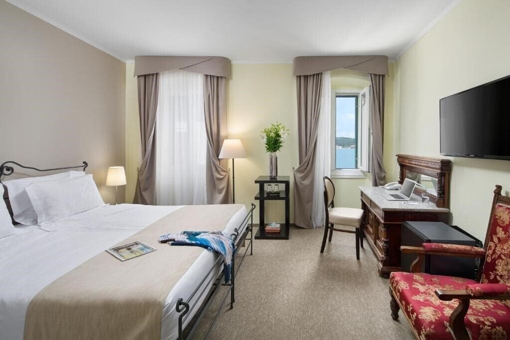Фотографія Hotel Heritage Angelo d'Oro 4*
