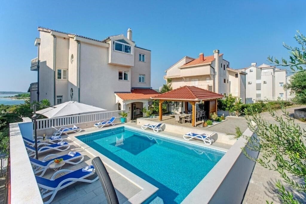 Фотографія Plavi Biser Apartments 4*