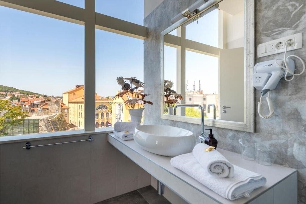 Фотография Prima Luce Luxury Rooms 4*