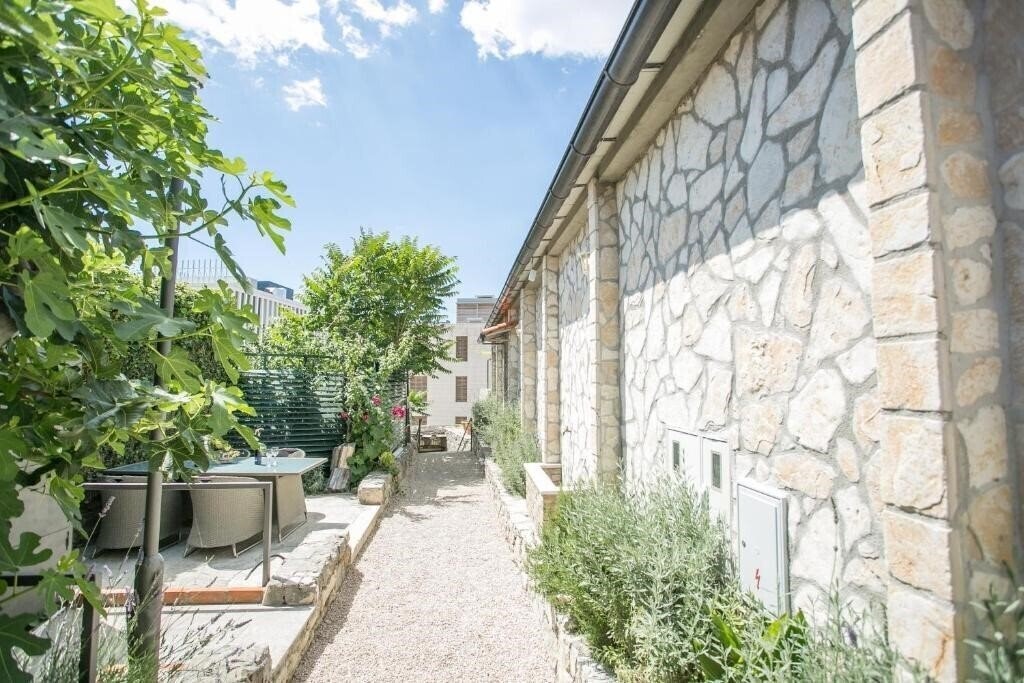Фотография Garden Apartment Hotel 3*