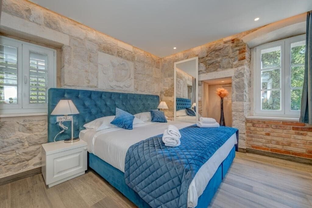 Отель Stonemasons Heritage 4*
