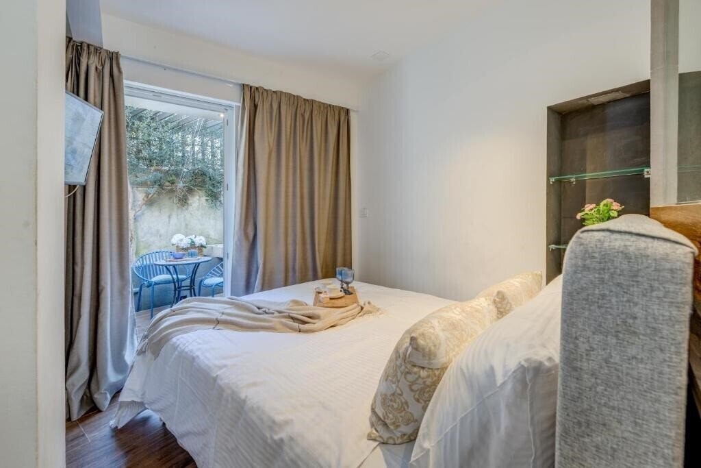 Фото Versi & Note Luxury Rooms 4*