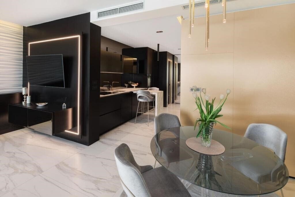 Фотографія Posh Residence Luxury Suites 5*