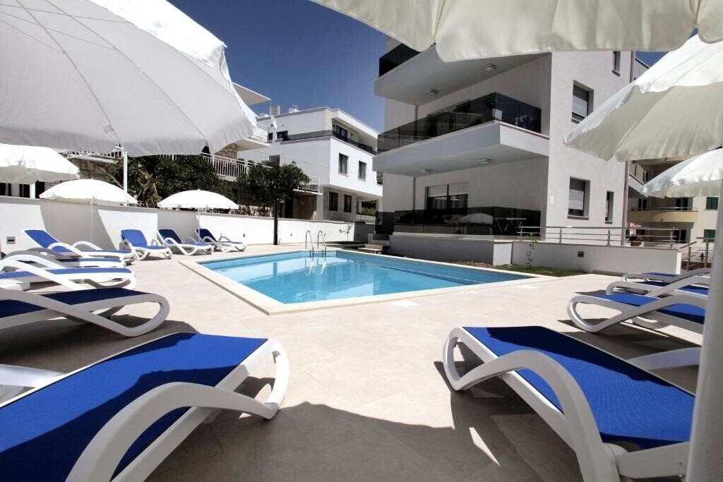 Отель Apartments Villa Aquamarie 4*