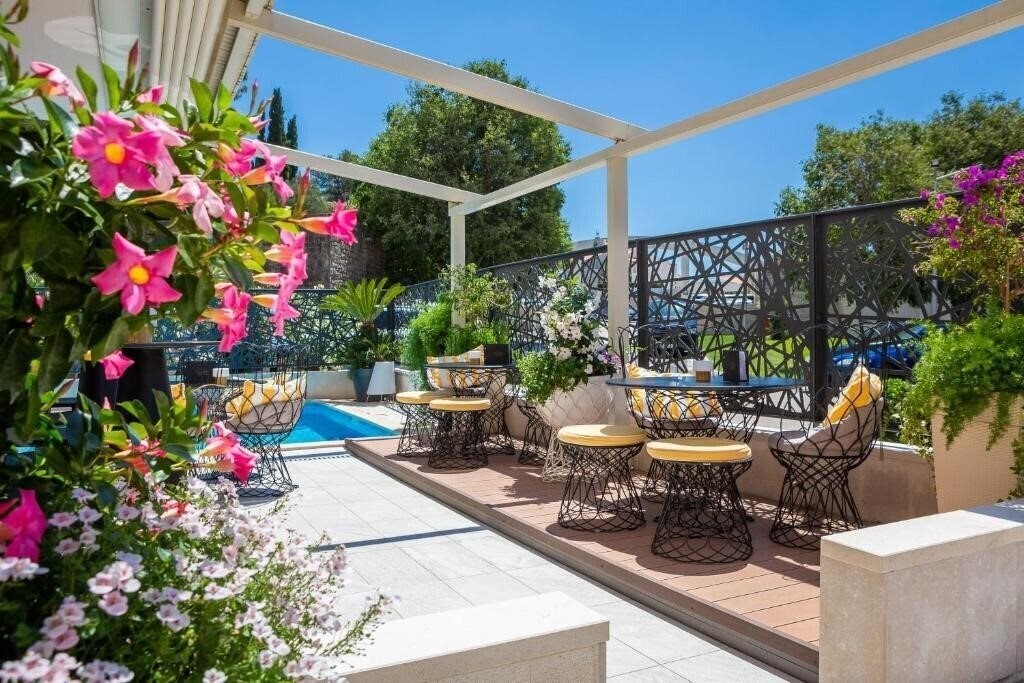 Фотографія Apart Hotel Flora Tucepi 4*