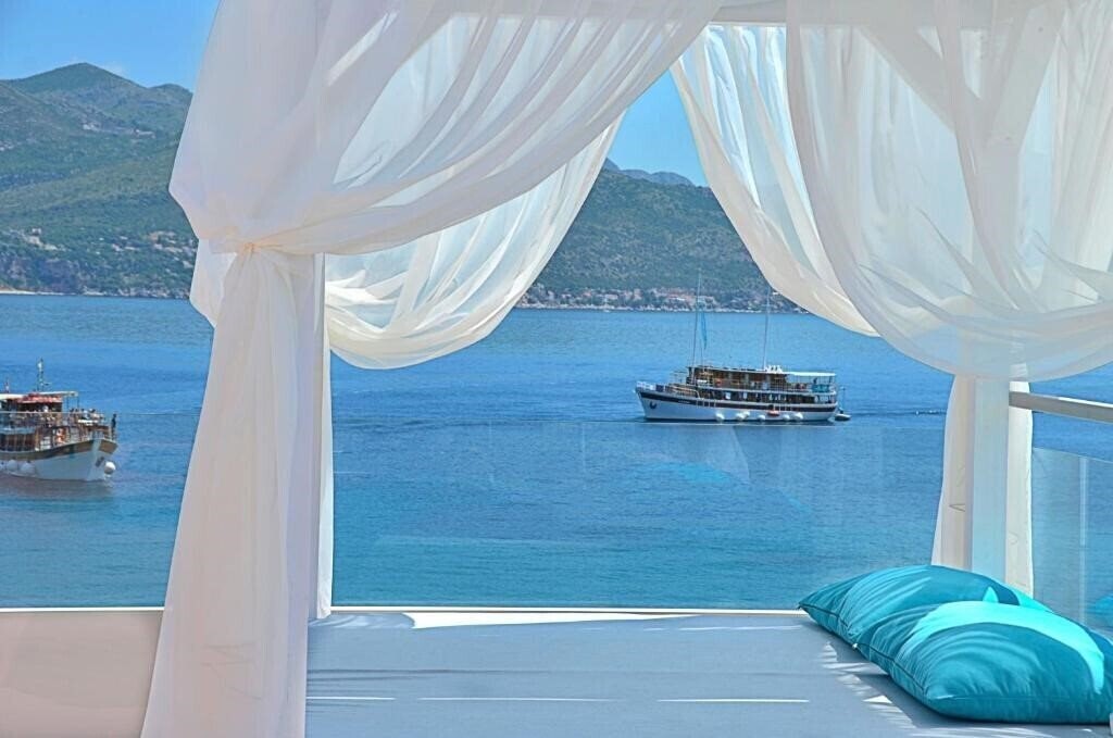Фотографія Kalamota Beach House 4*