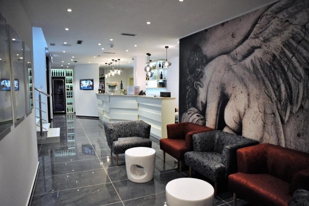 Фотографія Santiny Hotel Restaurant 4*