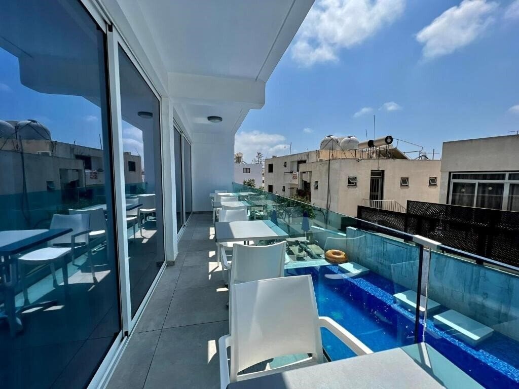 Фото Sunny Blue Hotel 4*