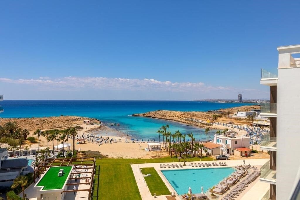Отель Chrysomare Beach Hotel & Resort 5*