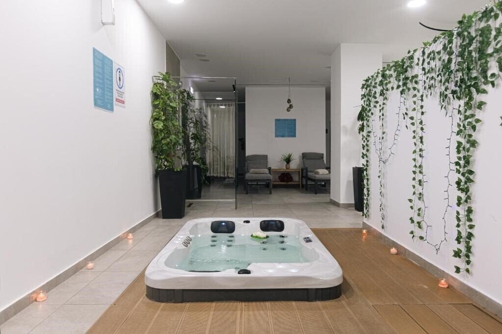 Фотографія Caramela Luxury Apartments 5*