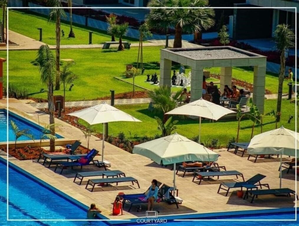 Фотографія Courtyard Long Beach Holiday Resort 5*
