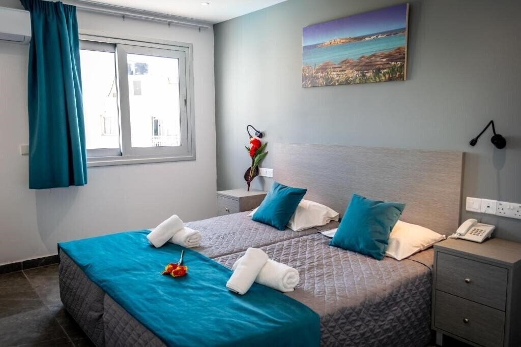 Фото Amaos Hotel Apartments 3*