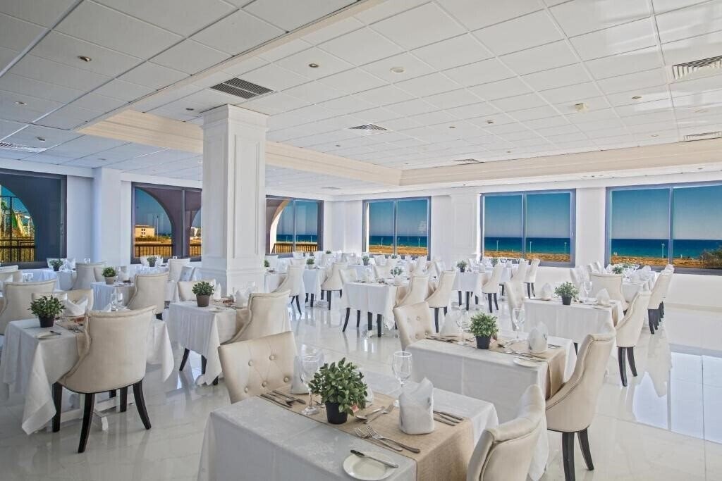 Фотография Nelia Sea Breeze 4*