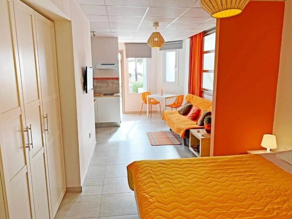 Фотографія Rainbow Apartments 3*