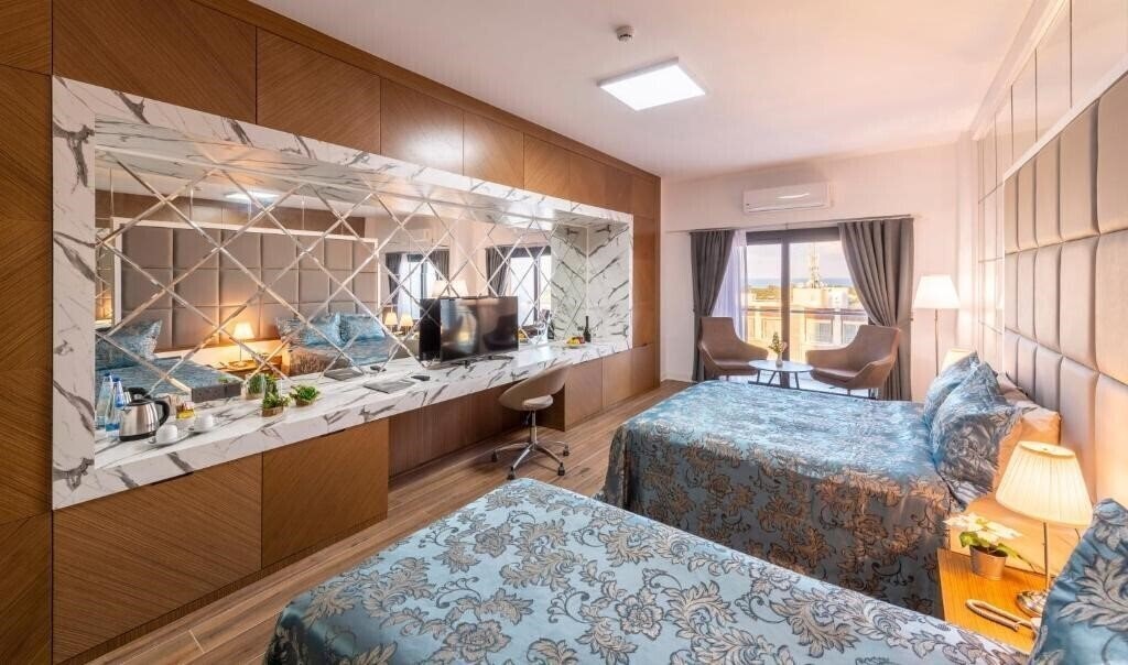 Фото Novel Centre Point Hotel 3*