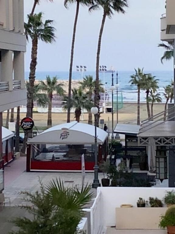 Отель Larnaca Beach Apartment 3*