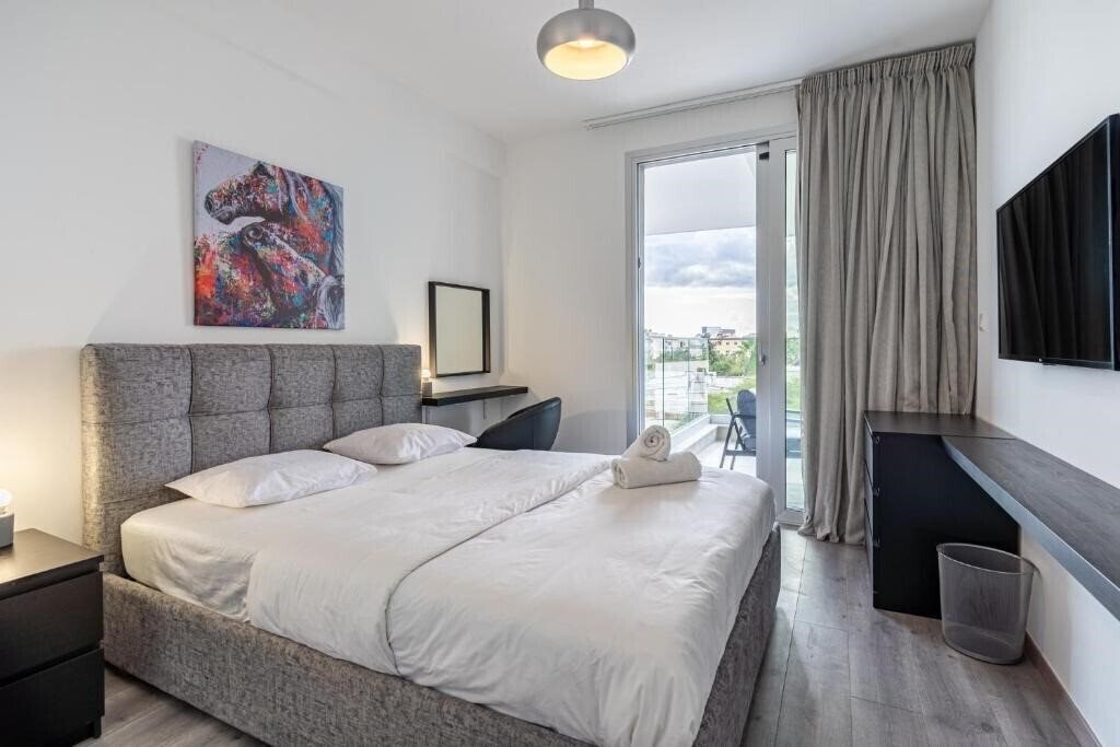 Фото Sunshine 1-Bedroom Apartment In Larnaca 2*