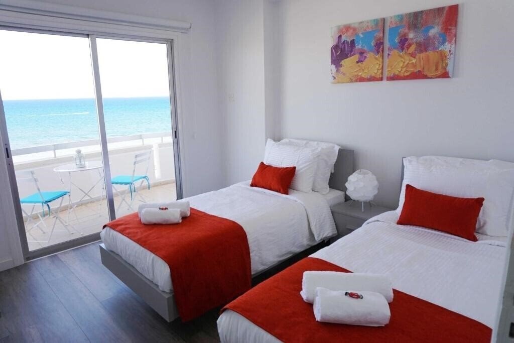 Фото Lazuli Sea View Beachfront Ap 43 3*